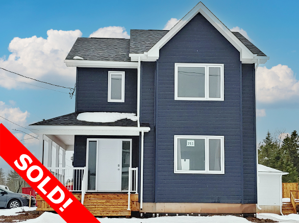 Dark blue sided two story family home fully finished and ready to move in. Marked as sold.